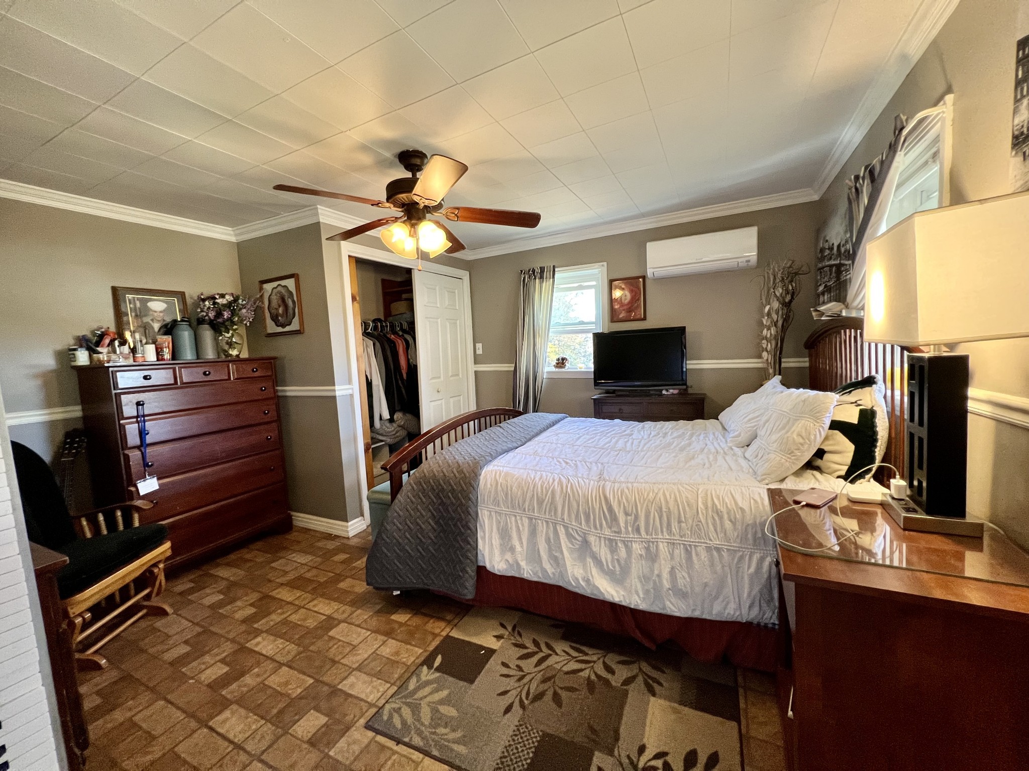 1076 Southside Road Southside, TN 37171 - Photo 27 of 27 a bedroom with a bed and a chandelier