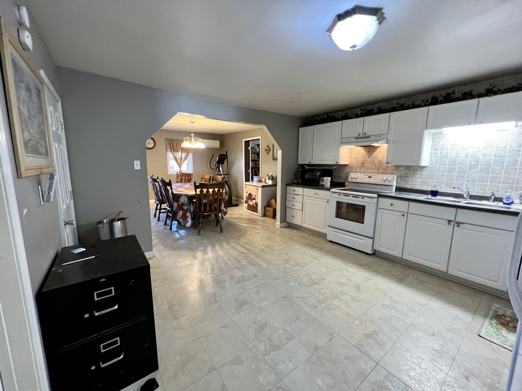 1076 Southside Road Southside, TN 37171 - Photo 7 of 27 a kitchen with stainless steel appliances granite countertop a stove and a sink