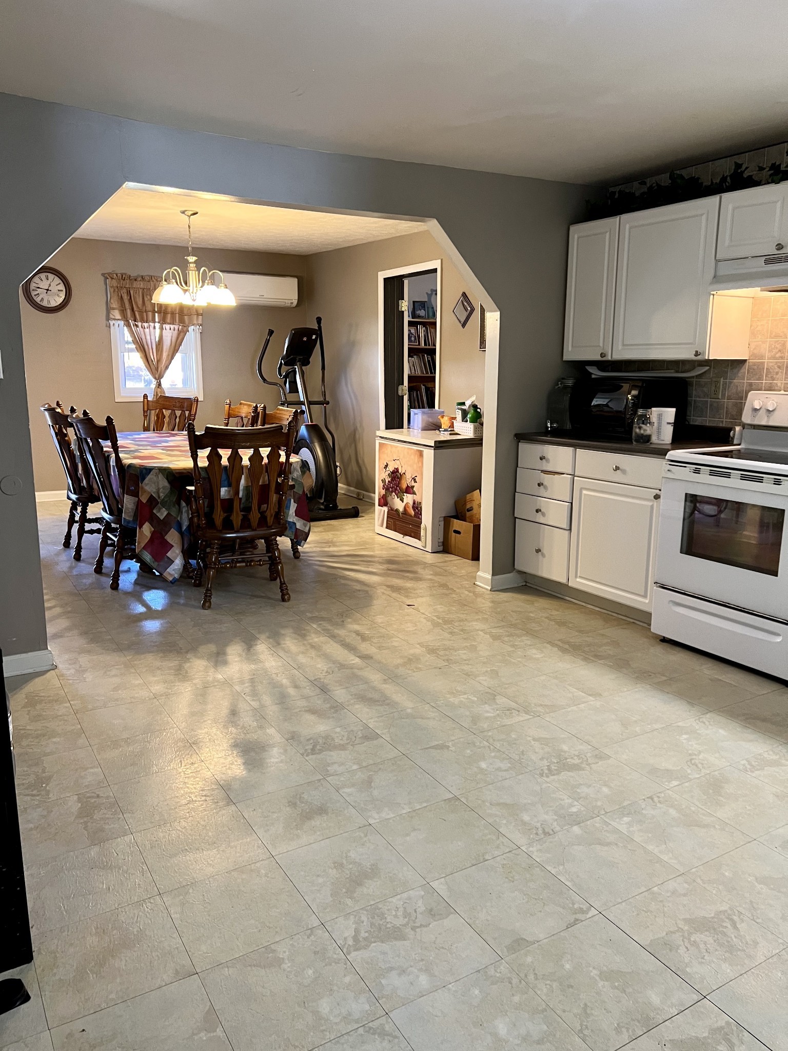 1076 Southside Road Southside, TN 37171 - Photo 8 of 27 a kitchen with lots of wooden cabinets a sink and a stove