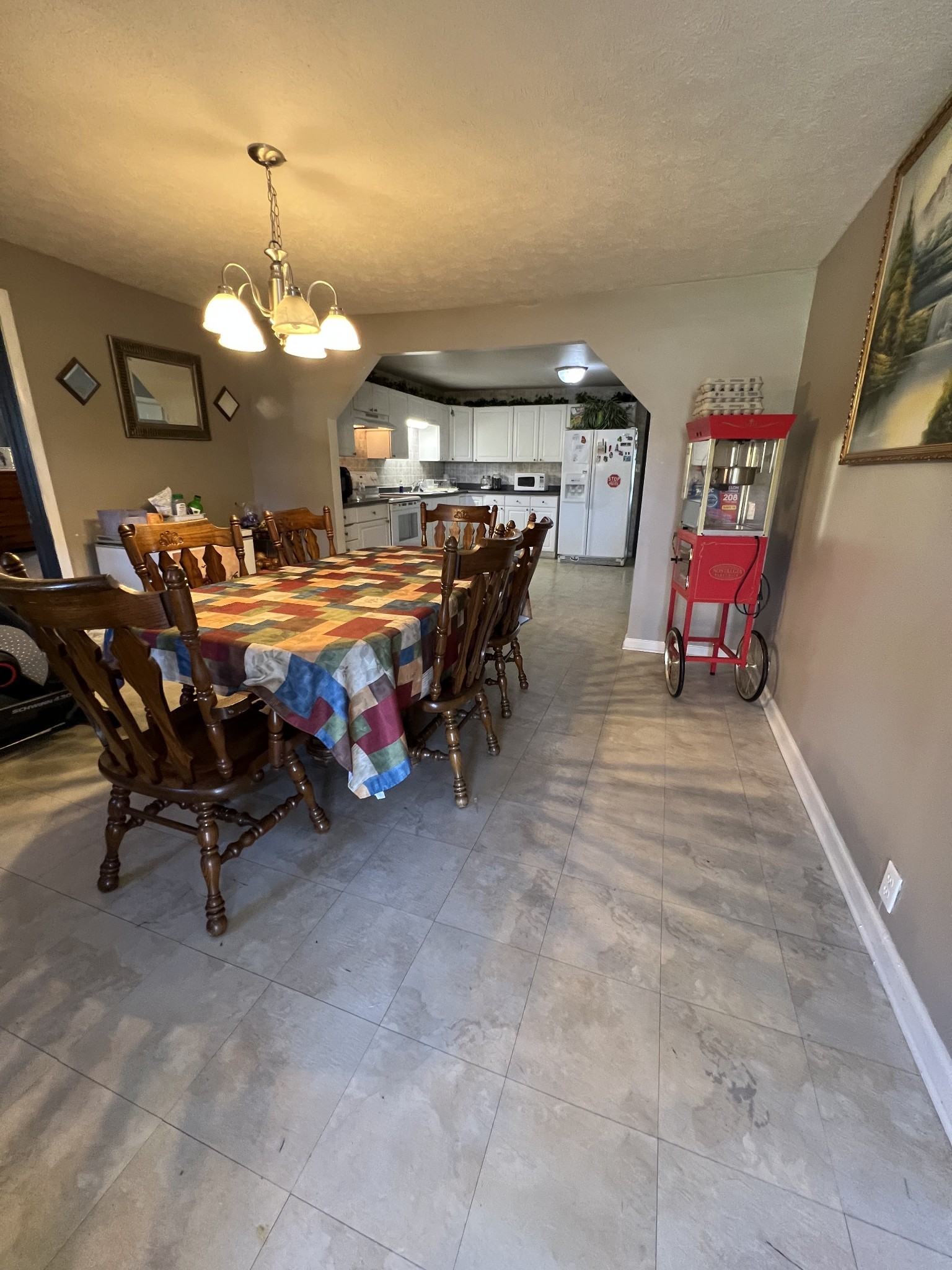 1076 Southside Road Southside, TN 37171 - Photo 9 of 27 a view of a dining room with furniture and chandelier