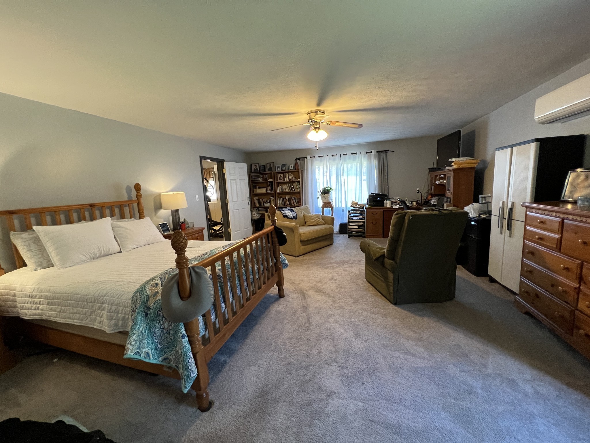 1076 Southside Road Southside, TN 37171 - Photo 10 of 27 a bed room with furniture and a flat screen tv