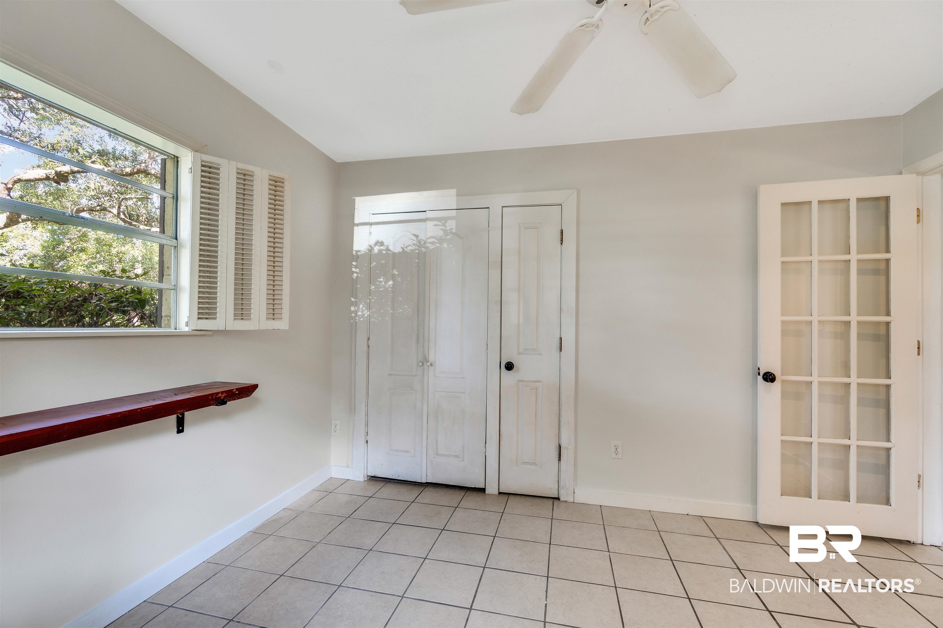 34341 Lost River Road Seminole, AL 36574 - Photo 15 of 36 Entrance foyer featuring light tile patterned floors and a ceiling fan