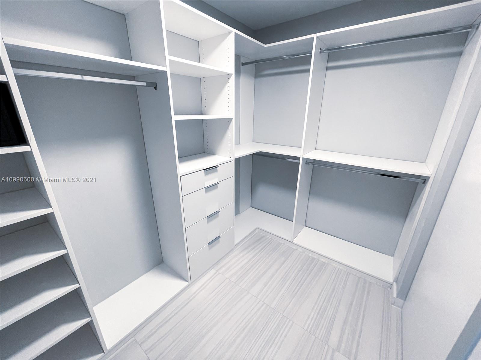 1080 Brickell Avenue, Unit 3702 Miami, FL 33131 - Photo 17 of 39 a view of an empty walk in closet