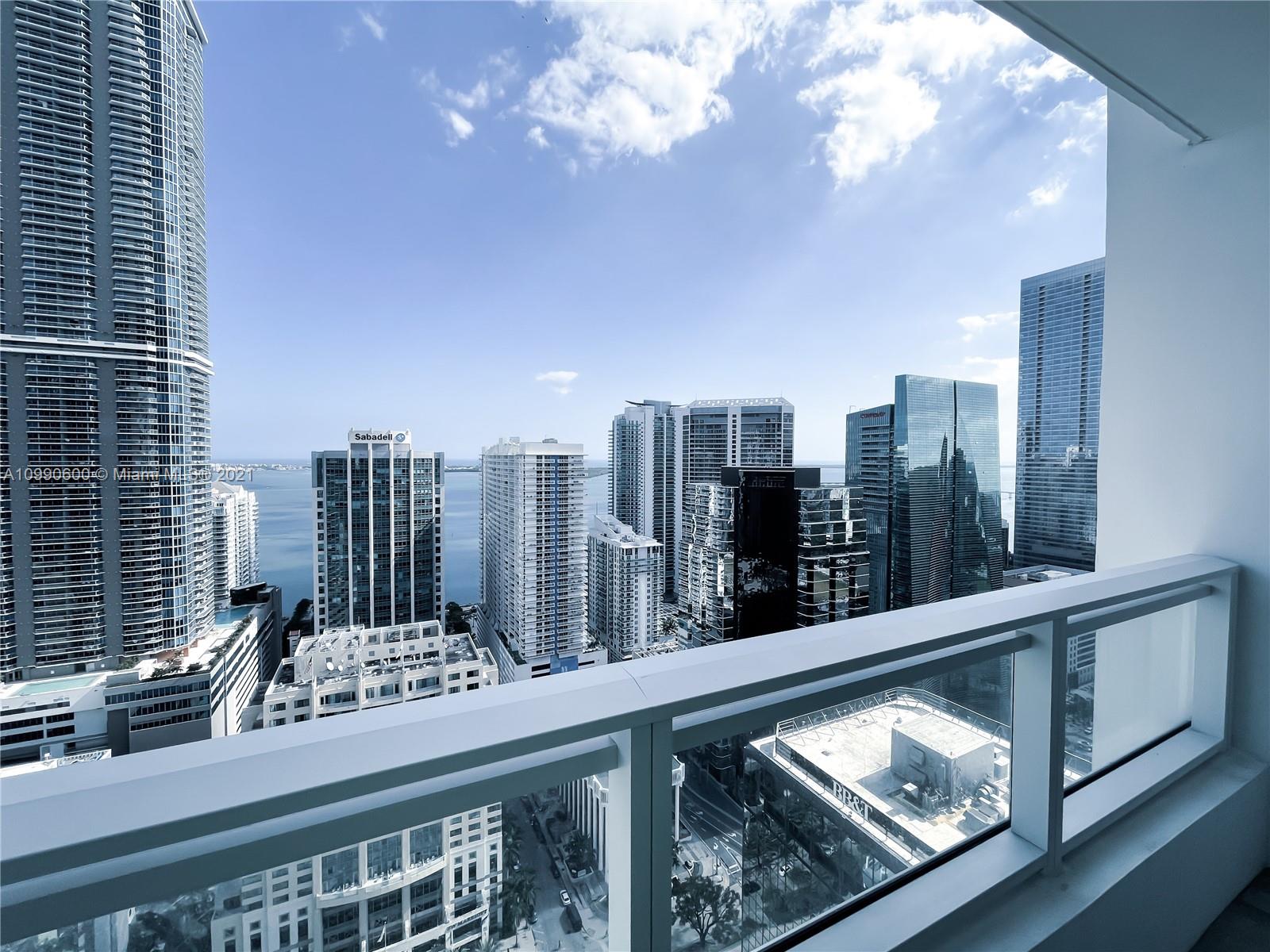 1080 Brickell Avenue, Unit 3702 Miami, FL 33131 - Photo 19 of 39 a view of a city from a balcony
