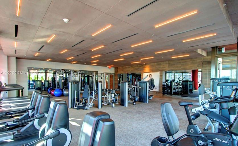 1080 Brickell Avenue, Unit 3702 Miami, FL 33131 - Photo 32 of 39 a view of a room with gym equipment