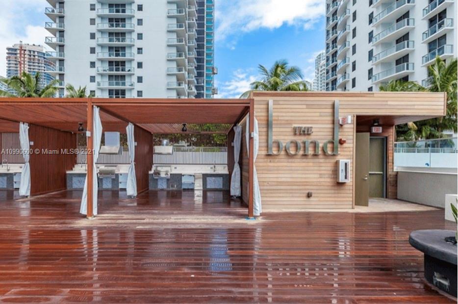 1080 Brickell Avenue, Unit 3702 Miami, FL 33131 - Photo 36 of 39 a view of a building with a porch