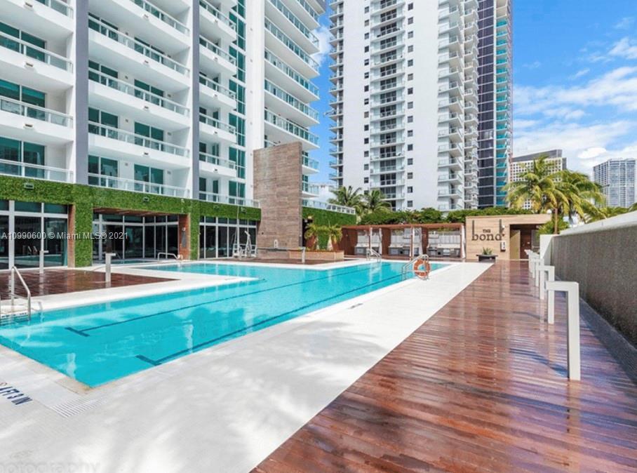 1080 Brickell Avenue, Unit 3702 Miami, FL 33131 - Photo 38 of 39 a view of building with yard