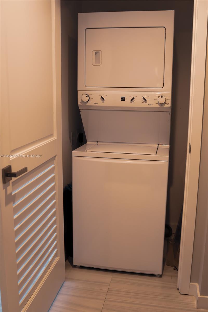 1080 Brickell Avenue, Unit 3702 Miami, FL 33131 - Photo 10 of 39 a close up view of washer and dryer