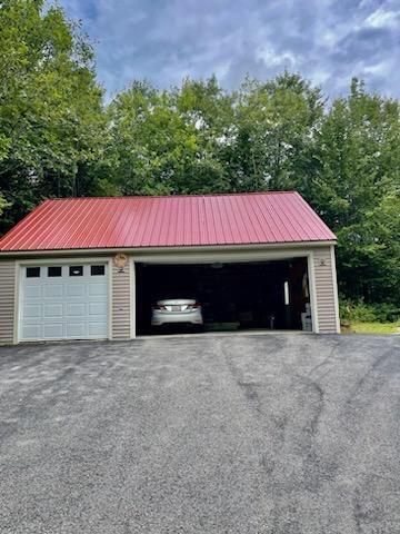 555 Main Street Sumner, ME 04292 - Photo 10 of 25 This garage could fit 3 compact cars