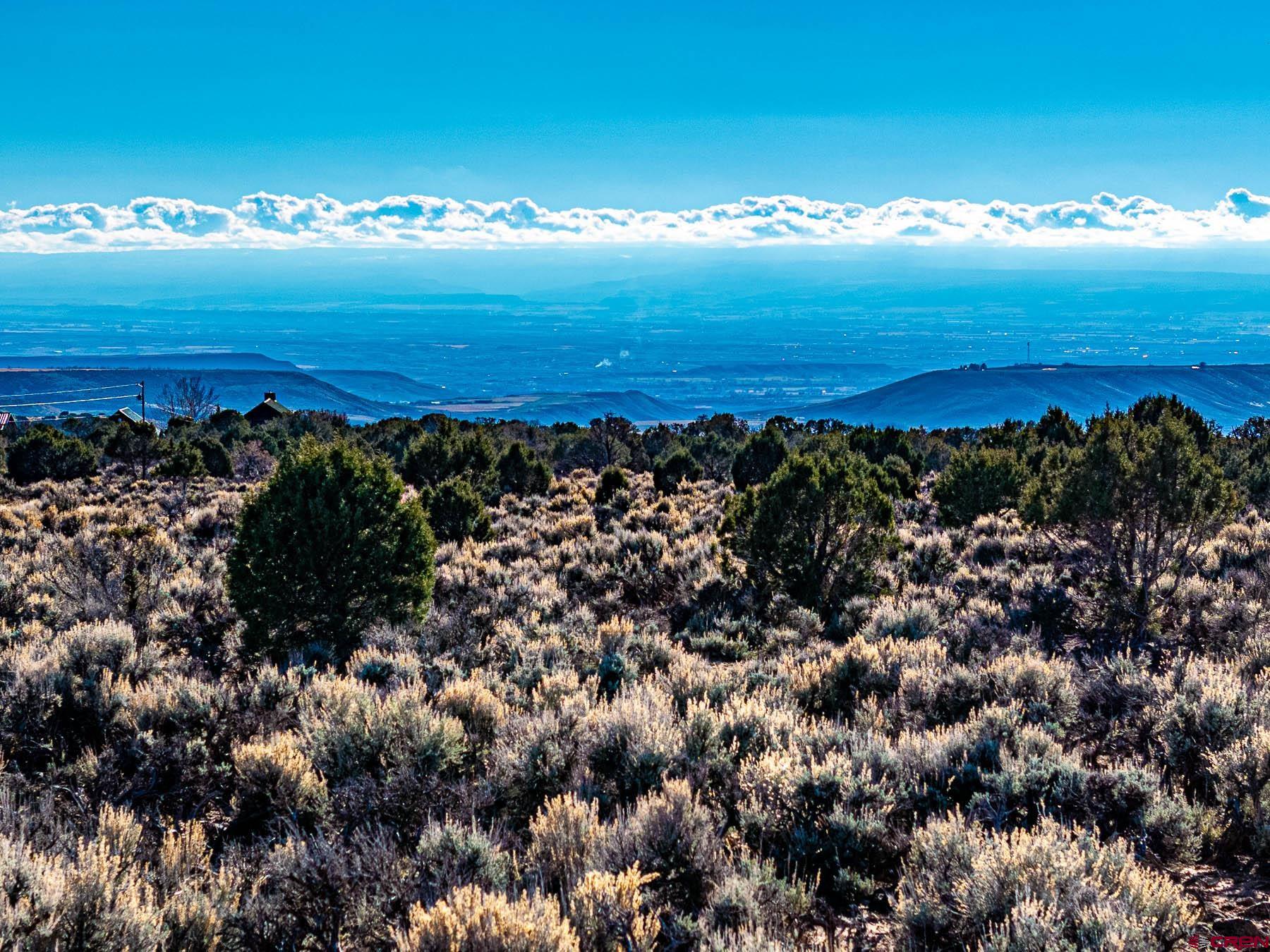 15369 2525 Road Cedaredge, CO 81413 - Photo 26 of 27 a view of a city with sunset