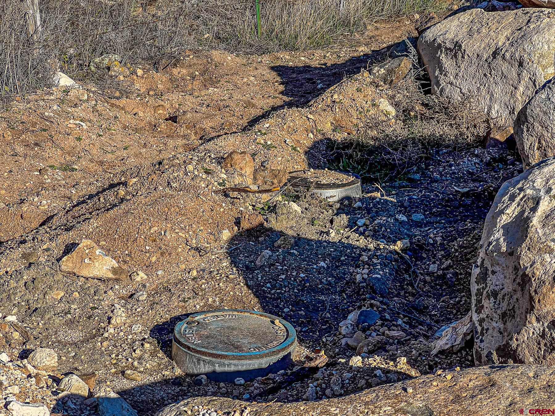 15369 2525 Road Cedaredge, CO 81413 - Photo 6 of 27 a bathroom with a toilet and a sink