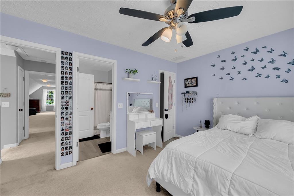 587-j B J B Owens Road Bethlehem, GA 30620 - Photo 57 of 99 a bedroom with a bed and a walk in closet