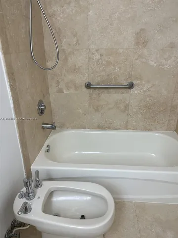 a bathroom with a sink and toilet
