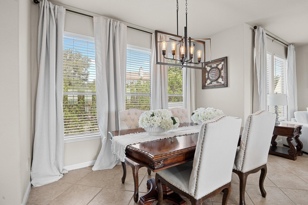 302 Southwind Road Lago Vista, TX 78645 - Photo 17 of 39 a dining room with furniture and window