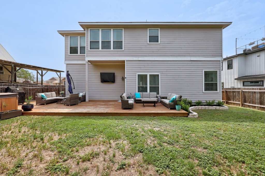 302 Southwind Road Lago Vista, TX 78645 - Photo 28 of 39 a view of a house with backyard and sitting area