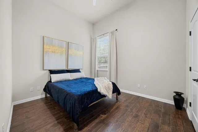 a room with a bed and a window