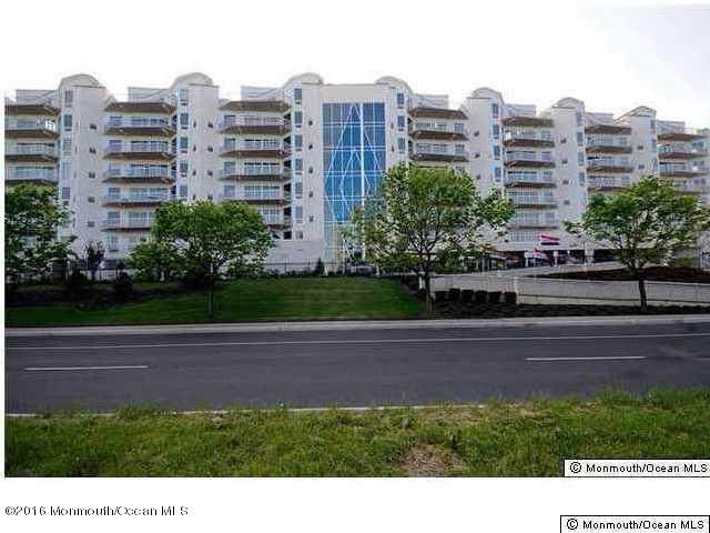 432 Ocean Boulevard North, Unit 411 Long Branch, NJ 07740 - Photo 1 of 3 a view of a tall building