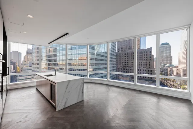 a bathroom with a tub sink toilet and a shower