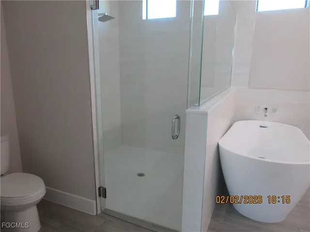 a bathroom with a sink and toilet