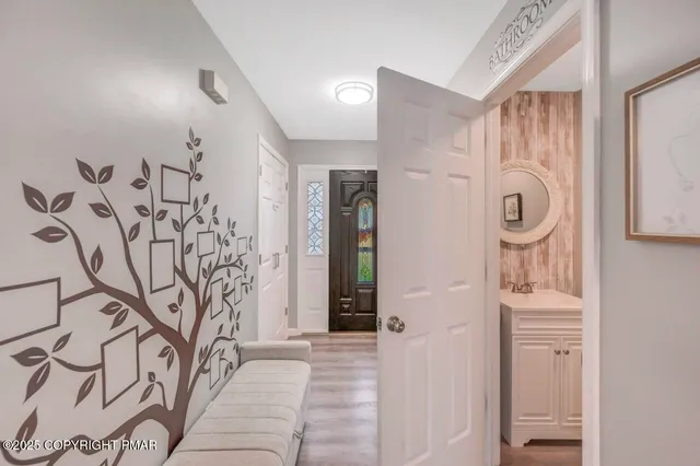 a bathroom with a bathtub and shower