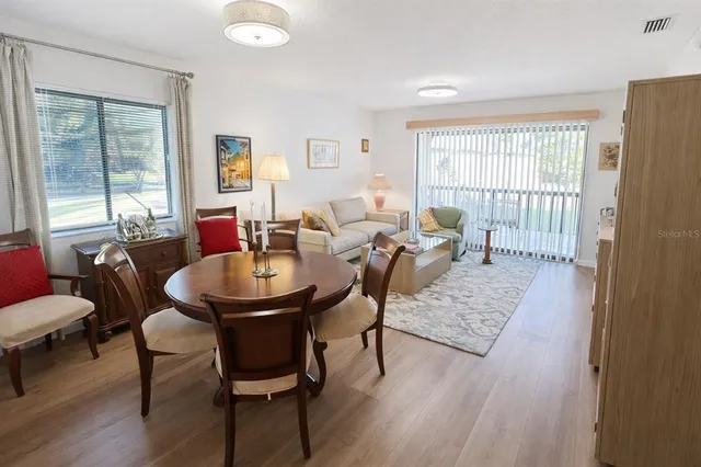 a bedroom with a bed and a chair