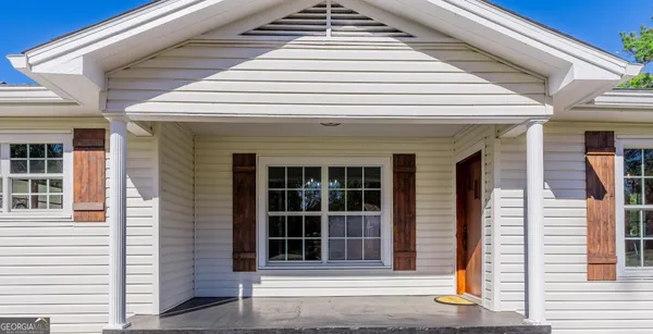 a view of a entryway door of the house