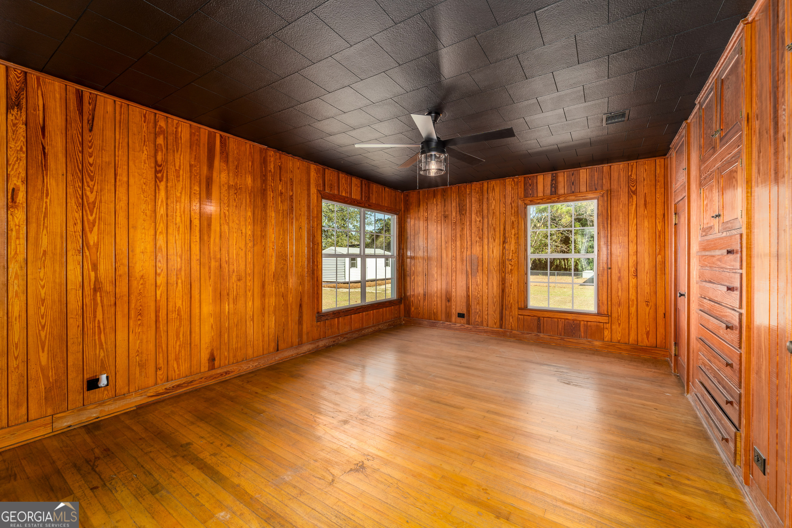 322 McGregor Street Blackshear, GA 31516 - Photo 18 of 30 a view of an empty room with a window and a bathroom