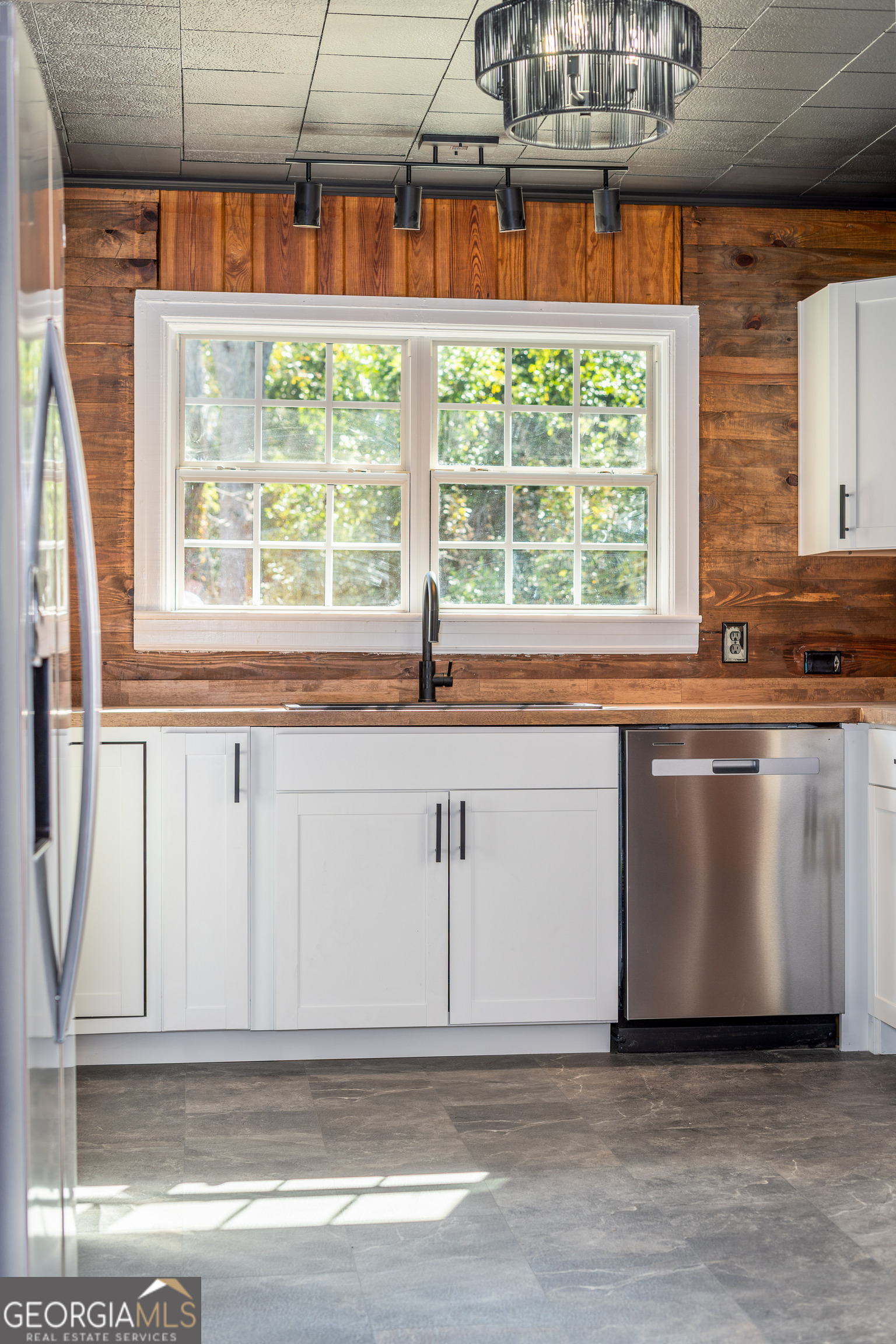 322 McGregor Street Blackshear, GA 31516 - Photo 2 of 30 a kitchen with a sink and large window