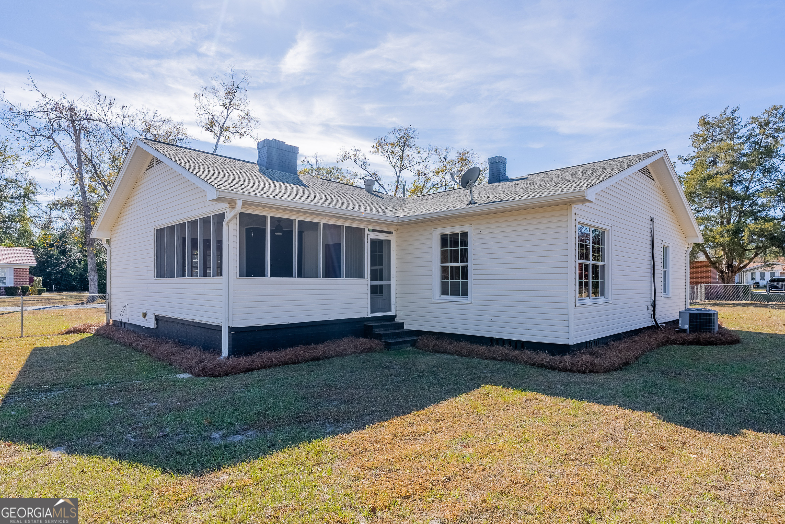 322 McGregor Street Blackshear, GA 31516 - Photo 28 of 30 a view of a house with a yard