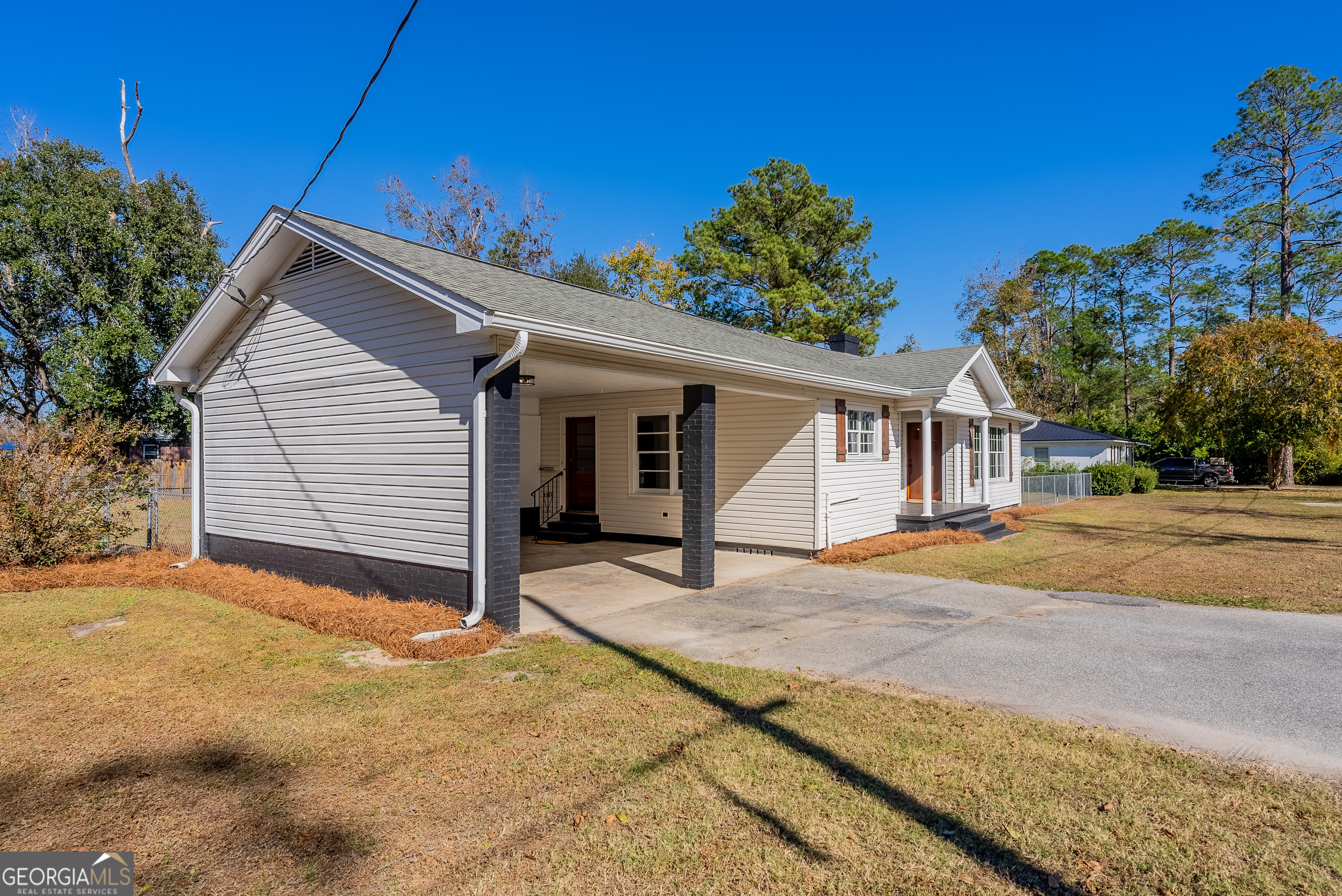 322 McGregor Street Blackshear, GA 31516 - Photo 29 of 30 a view of house with a yard and front area of house