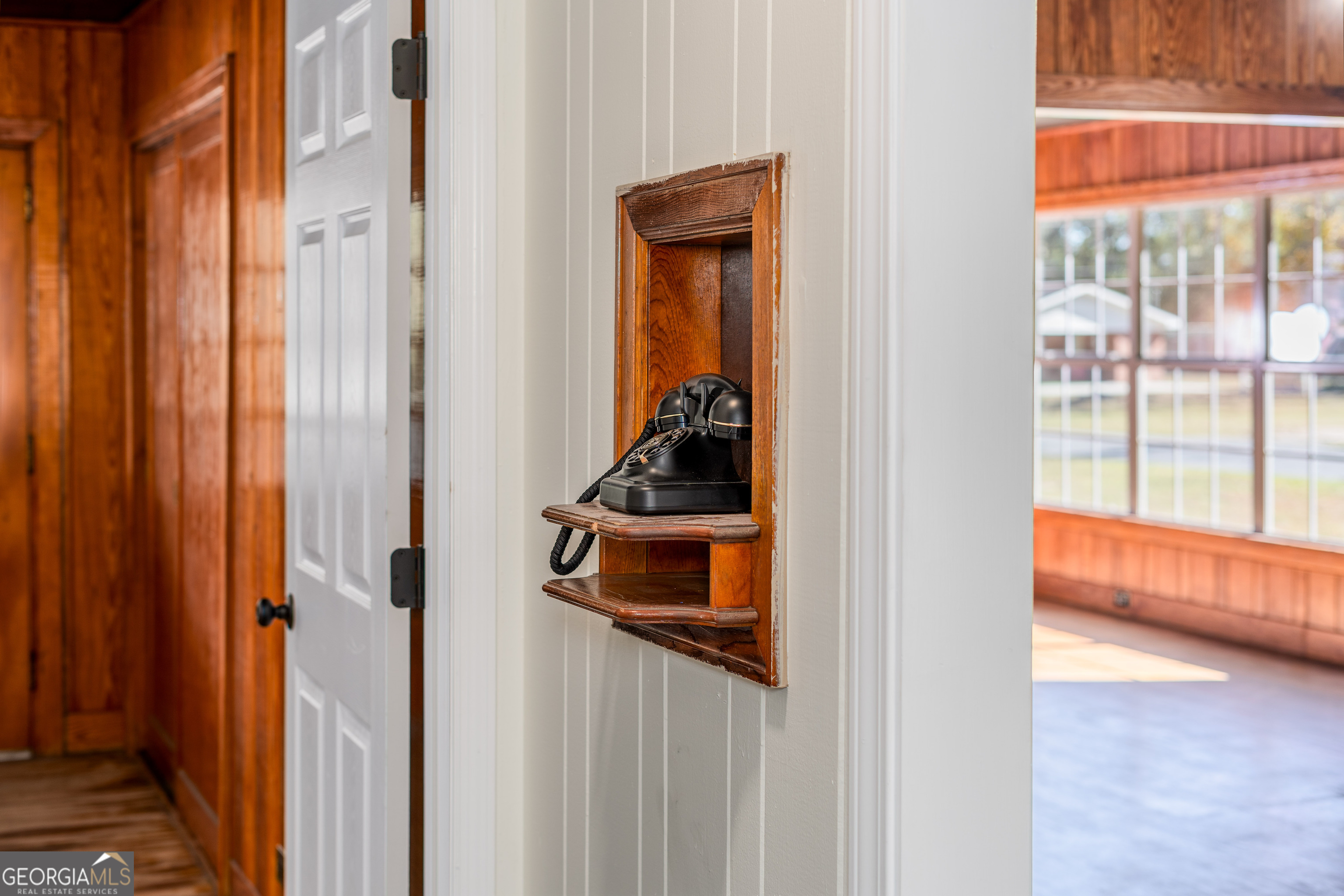 322 McGregor Street Blackshear, GA 31516 - Photo 3 of 30 a room that has a window and a wooden floor