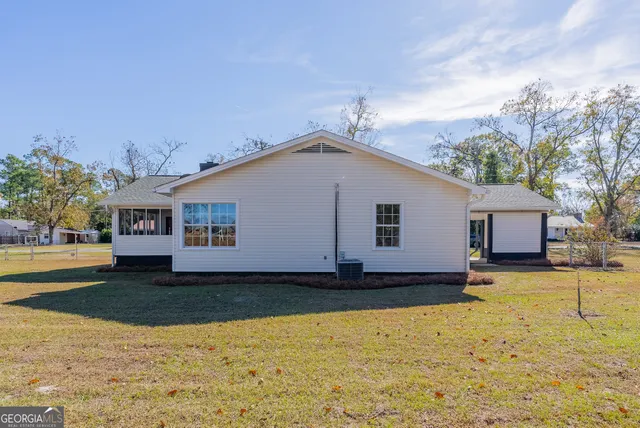 a house view with a garden space