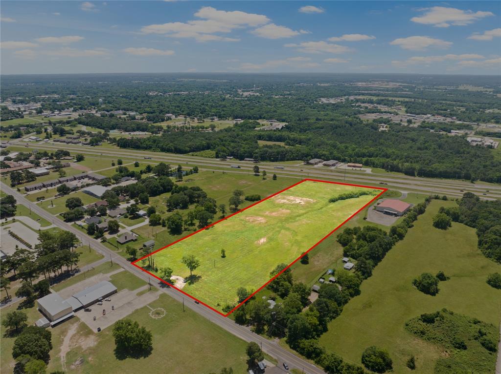 30 West Interstate 30 Service Road Mount Pleasant, TX 75455 - Photo 1 of 22 an aerial view of a city