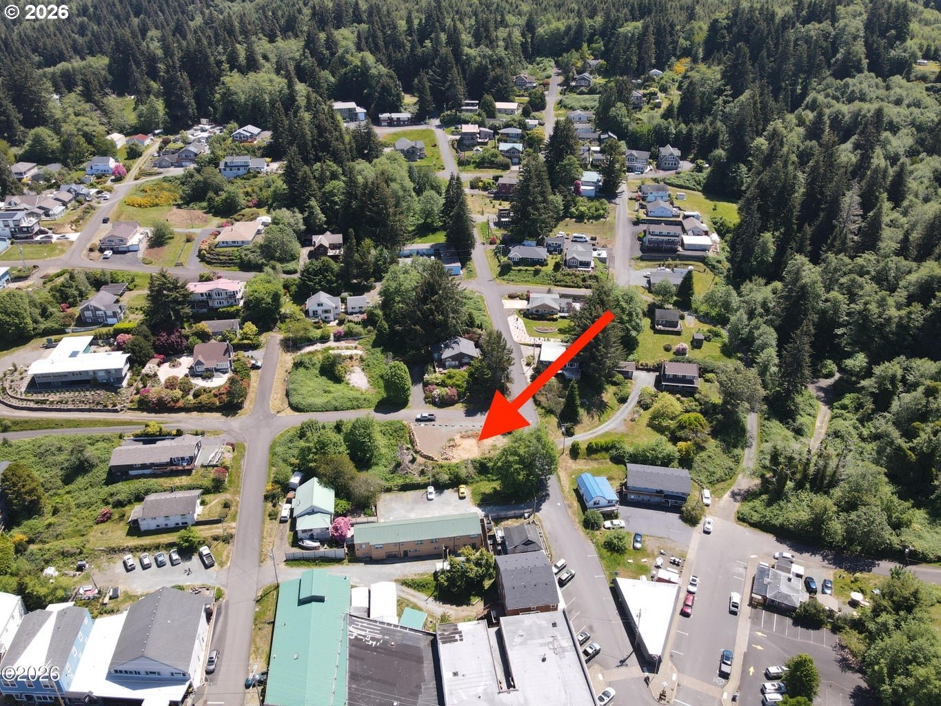 95 Gregory Street Wheeler, OR 97147 - Photo 2 of 20 an aerial view of residential houses with outdoor space