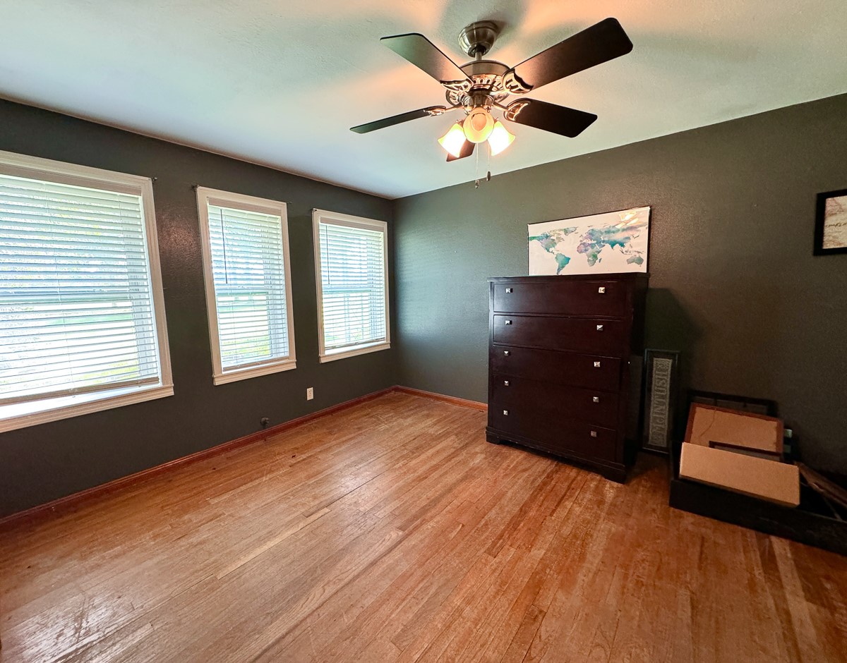 1 Hoke Road Richards, TX 77873 - Photo 12 of 43 a bedroom with a bed and a dresser