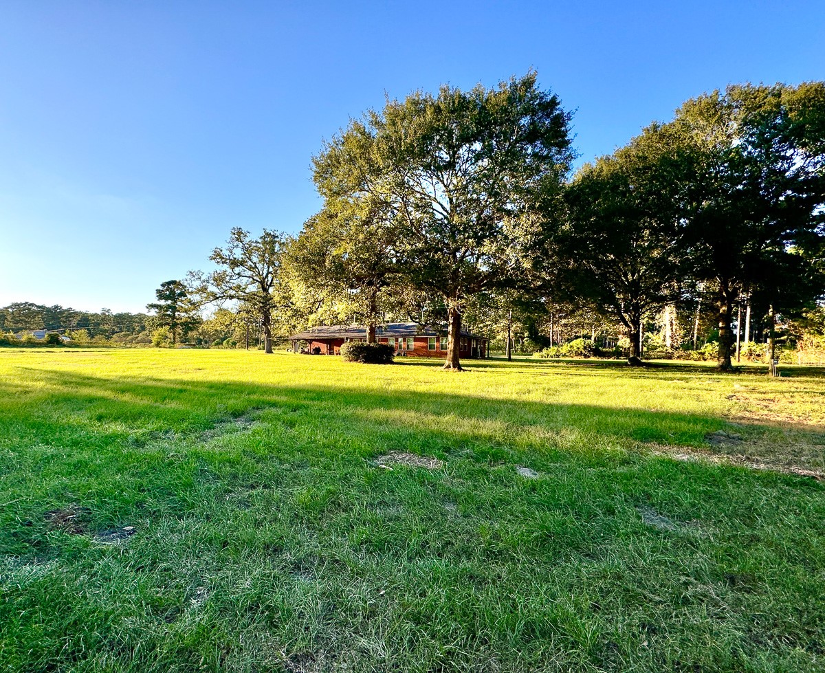 1 Hoke Road Richards, TX 77873 - Photo 21 of 43 a view of swimming pool with an outdoor space and seating area