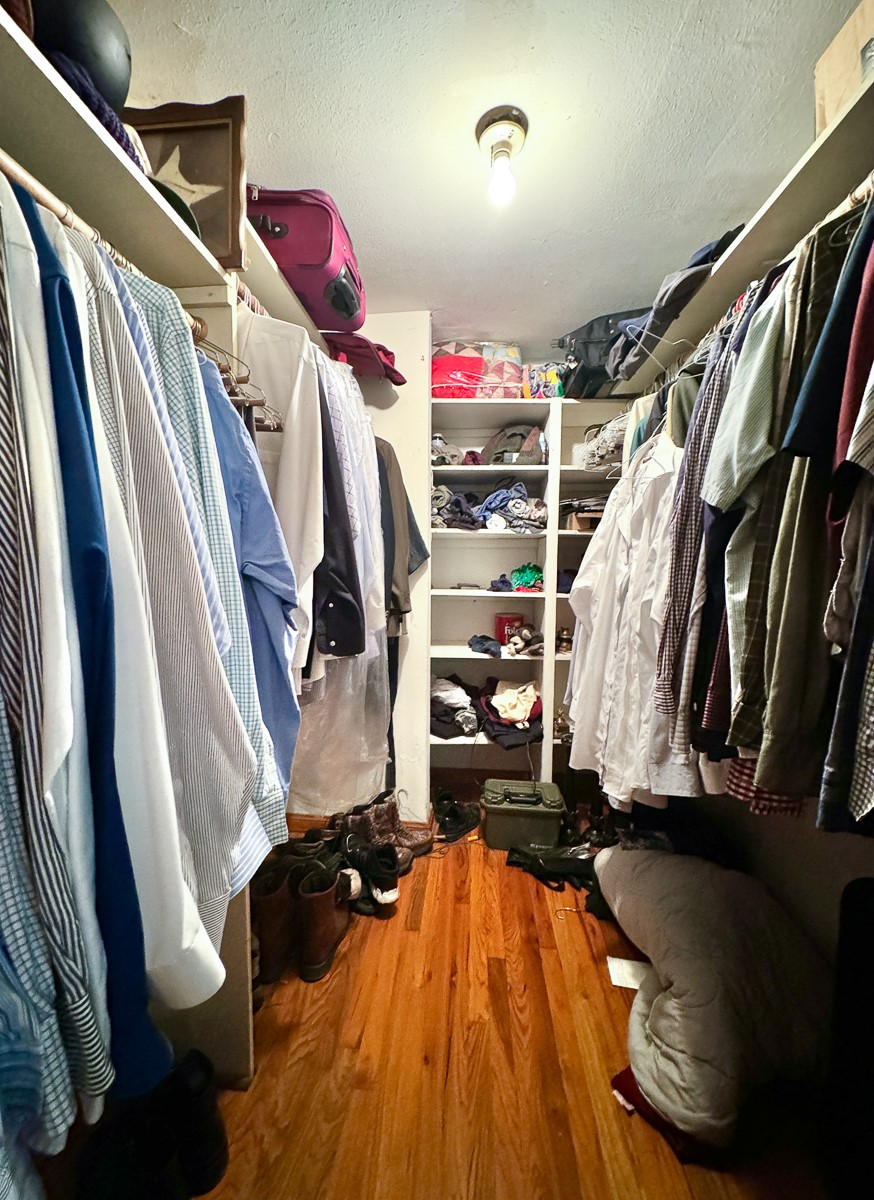 1 Hoke Road Richards, TX 77873 - Photo 9 of 43 a view of walk in closet with clothes and shoes