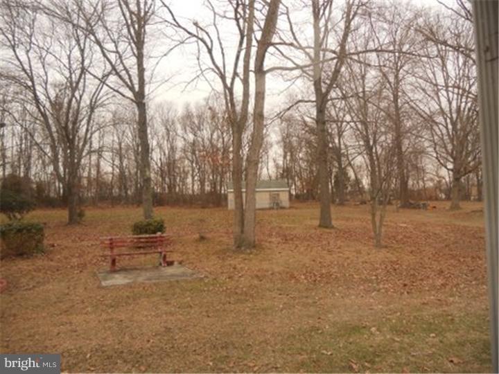 2762 Garwood Road Sicklerville, NJ 08081 - Photo 12 of 12 a backyard of a house with lots of green space