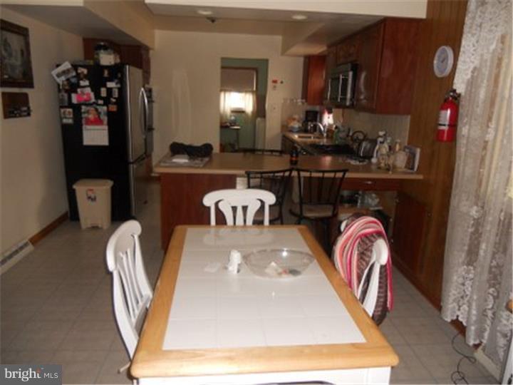 2762 Garwood Road Sicklerville, NJ 08081 - Photo 3 of 12 a room with furniture a washer and dryer