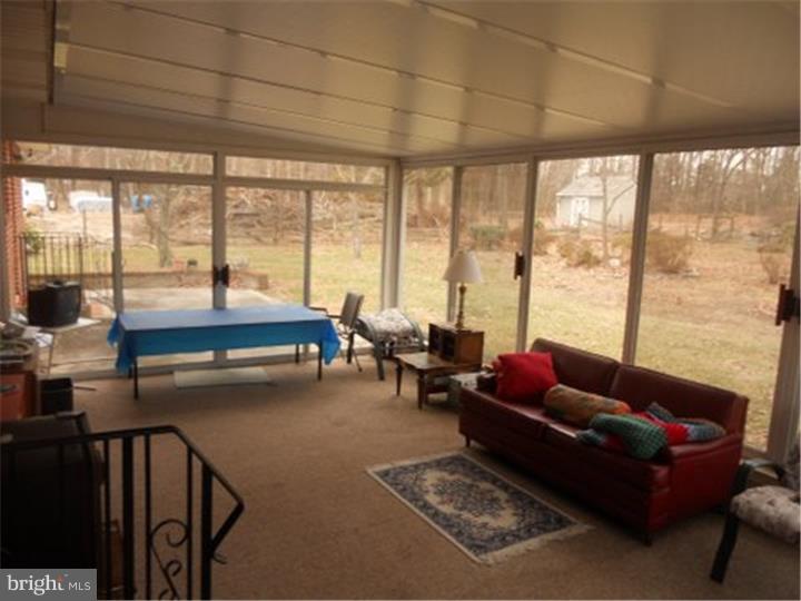 2762 Garwood Road Sicklerville, NJ 08081 - Photo 9 of 12 a living room with furniture and a large window