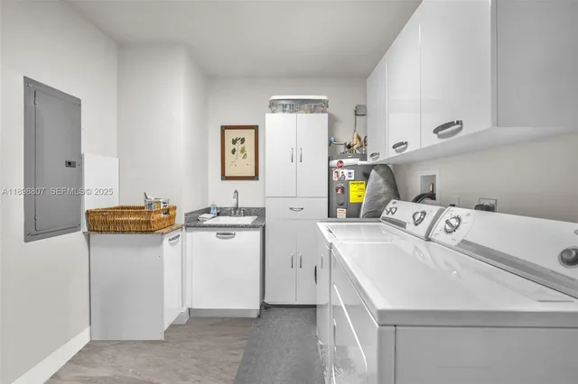 a utility room with dryer and washer
