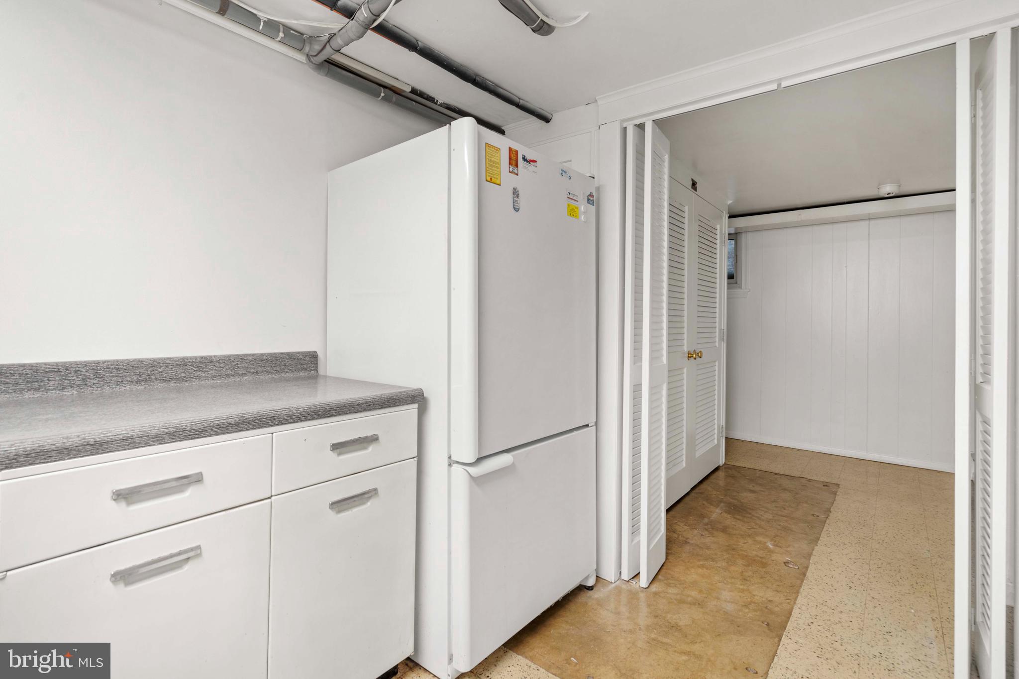3916 Braddock Road Alexandria, VA 22312 - Photo 23 of 29 Extra Refrigerator and Workspace in Laundry