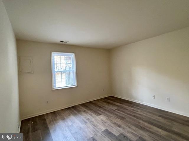 10 Kettle Court, Unit 76F Windsor Mill, MD 21244 - Photo 11 of 11 an empty room with wooden floor and windows