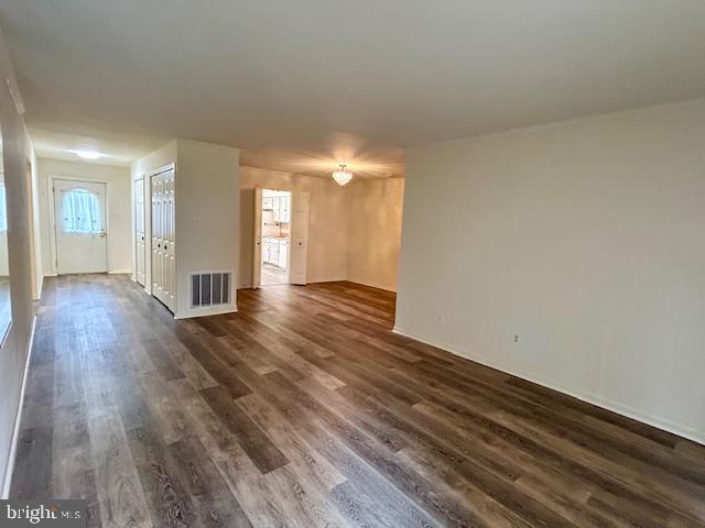 10 Kettle Court, Unit 76F Windsor Mill, MD 21244 - Photo 5 of 11 a view of an empty room and wooden floor