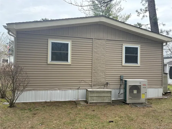 $140,000 | 525-159 Riverleigh Avenue, Unit 159, Riverhead, NY 11901