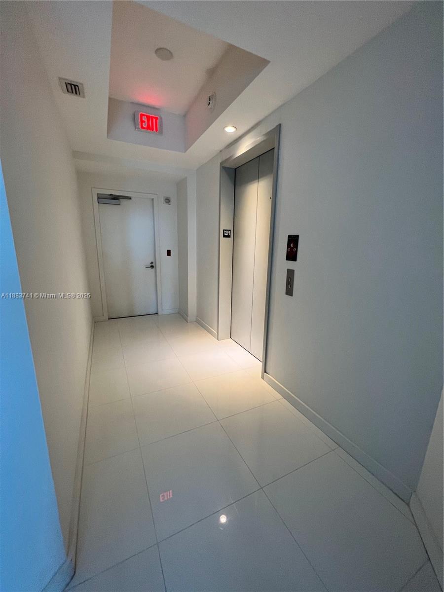 851 Northeast 1st Avenue, Unit 1208 Miami, FL 33132 - Photo 26 of 26 a view of hallway