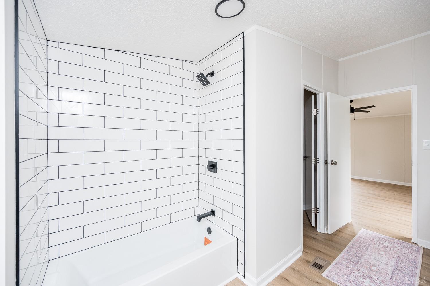 1636 Maddox Road Gladys, VA 24554 - Photo 20 of 54 a bathroom with a bathtub and shower