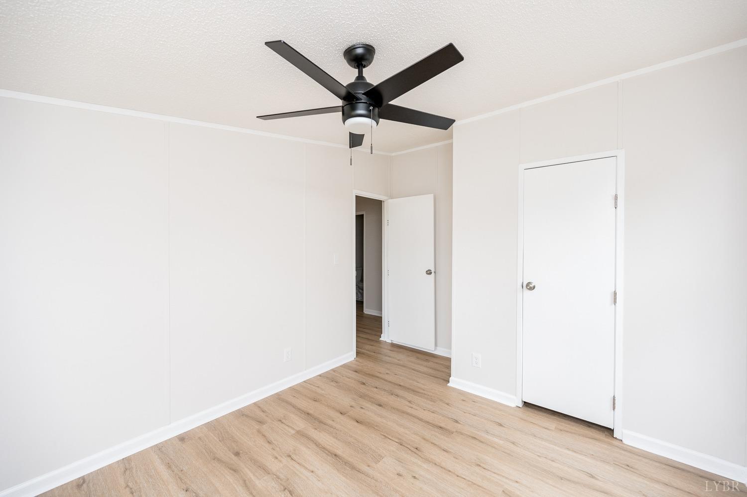 1636 Maddox Road Gladys, VA 24554 - Photo 27 of 54 a view of a hallway with wooden floor