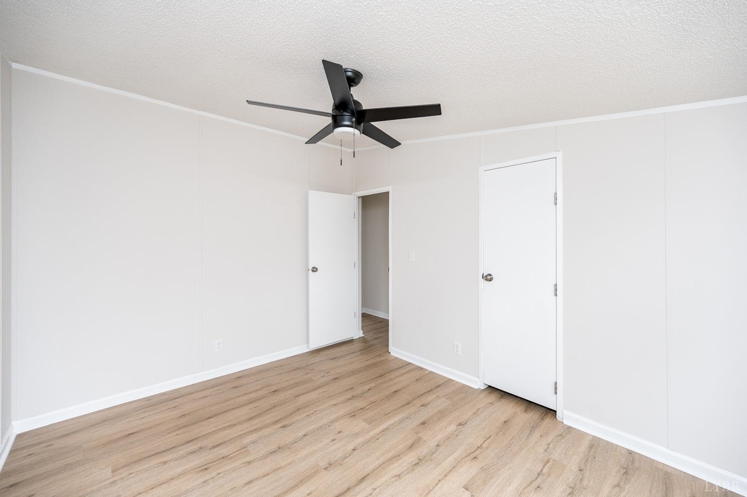 1636 Maddox Road Gladys, VA 24554 - Photo 29 of 54 a view of an empty room with wooden floor
