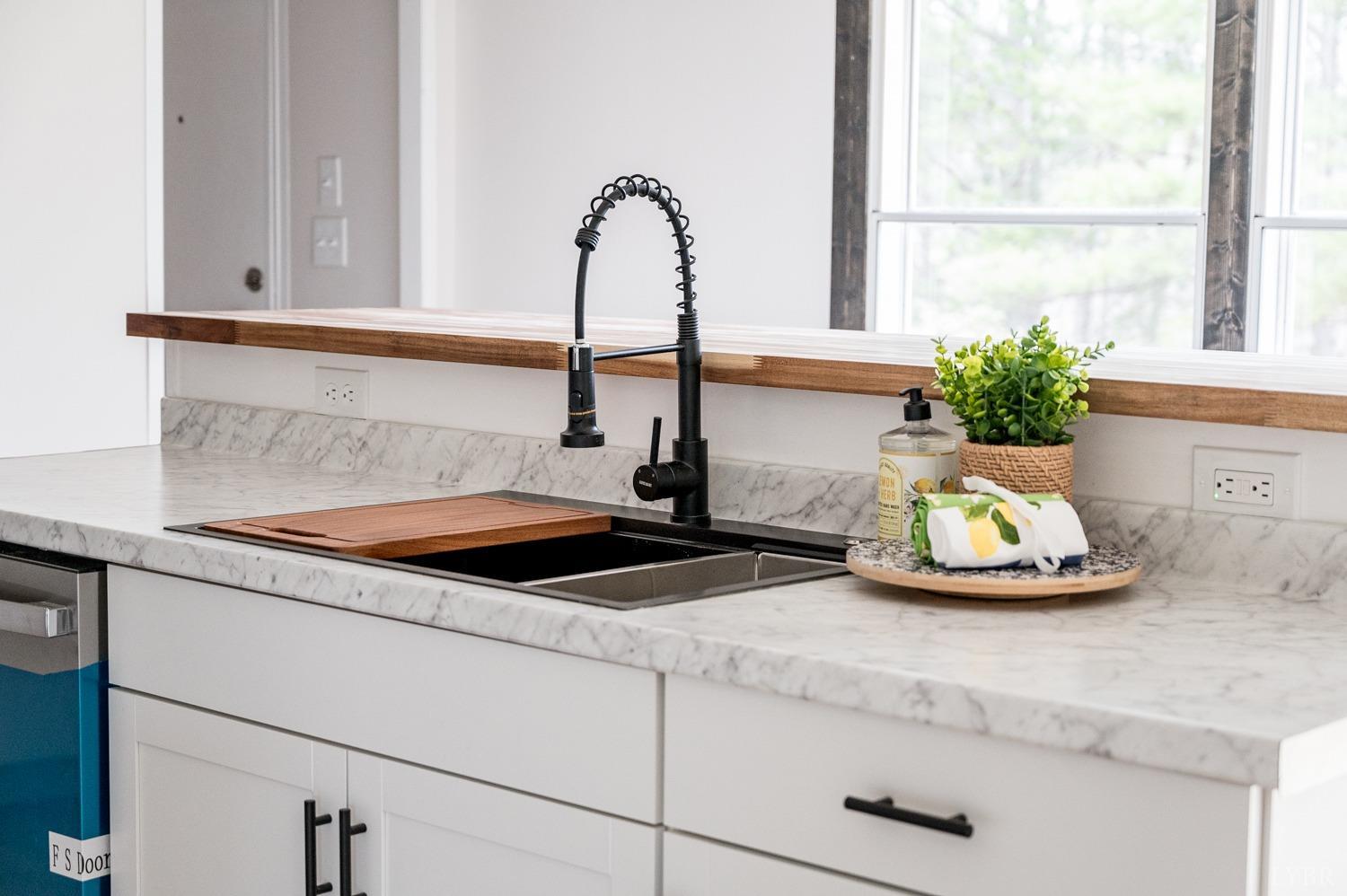 1636 Maddox Road Gladys, VA 24554 - Photo 33 of 54 a kitchen with a sink and a window